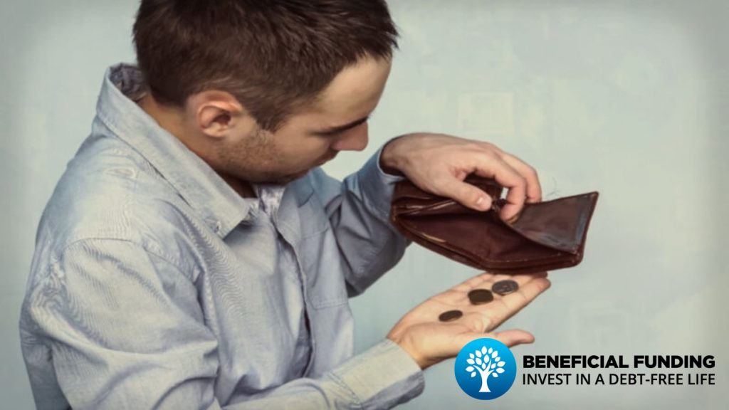 man-checking-wallet-for-money