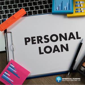 notepad-with-the-words-personal-loan-written-on-it