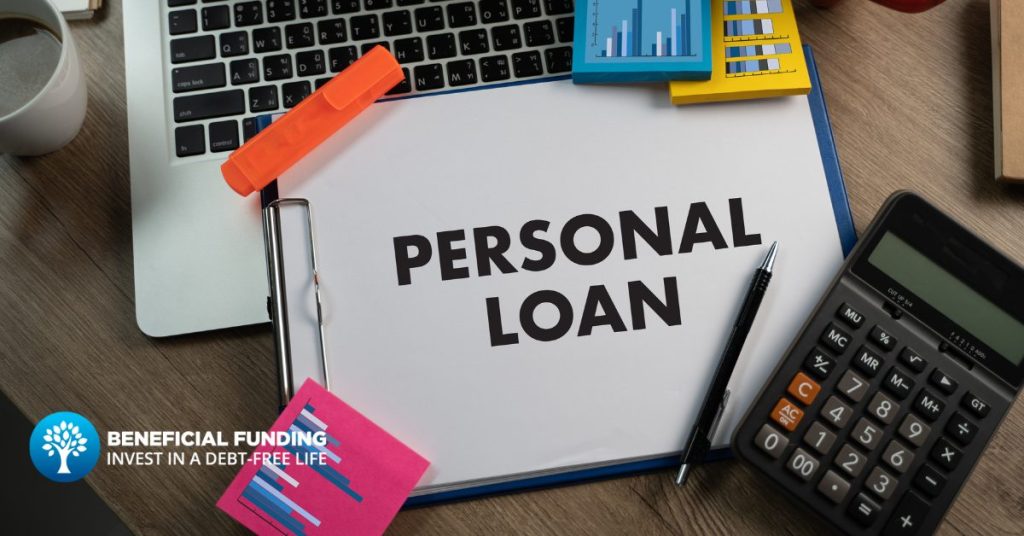 notepad-with-the-words-personal-loan-written-on-it